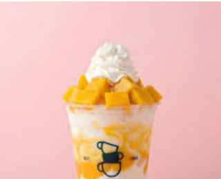 Child with cotton candy at outdoor event