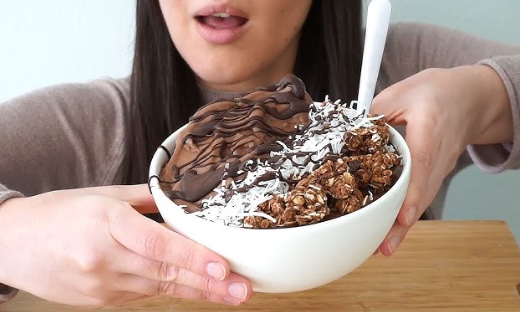 Child enjoying dessert at an event