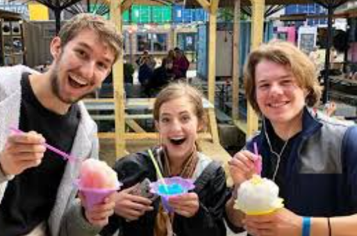 Group holding shaved ice treats